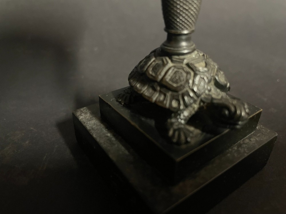 A carved coconut shell standing cup mounted on a bronze tortoise pedestal with a square stone base. View III
