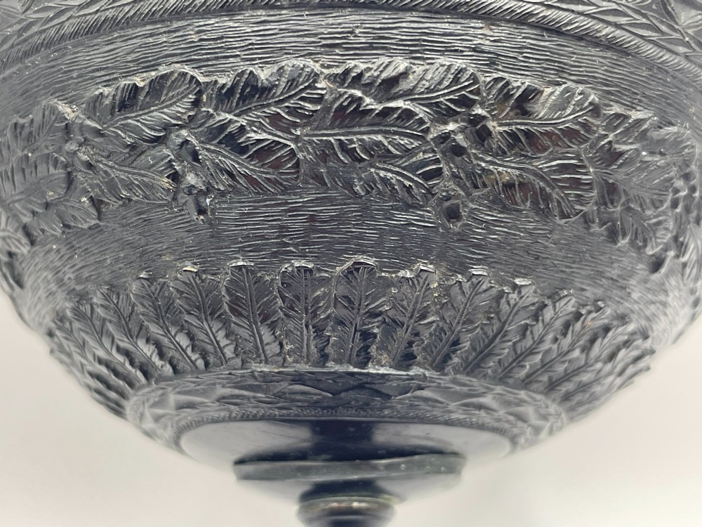A carved coconut shell standing cup mounted on a bronze tortoise pedestal with a square stone base. View IV