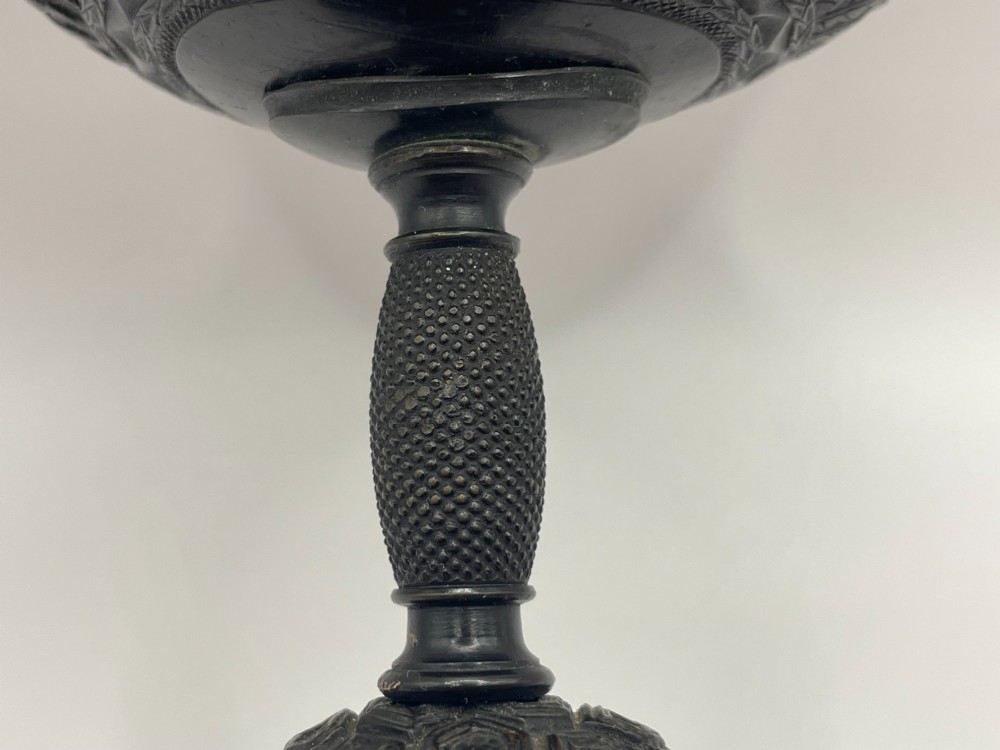 A carved coconut shell standing cup mounted on a bronze tortoise pedestal with a square stone base. View VI