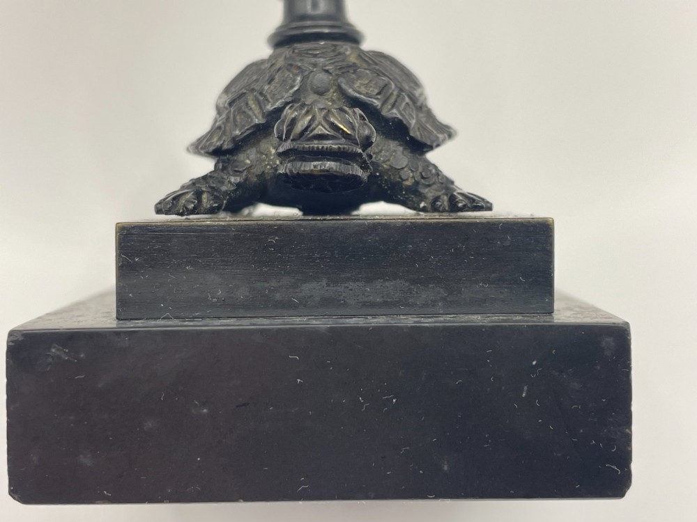 A carved coconut shell standing cup mounted on a bronze tortoise pedestal with a square stone base. View VIII