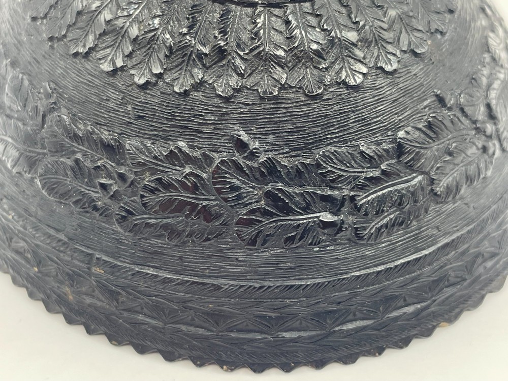 A carved coconut shell standing cup mounted on a bronze tortoise pedestal with a square stone base. View X