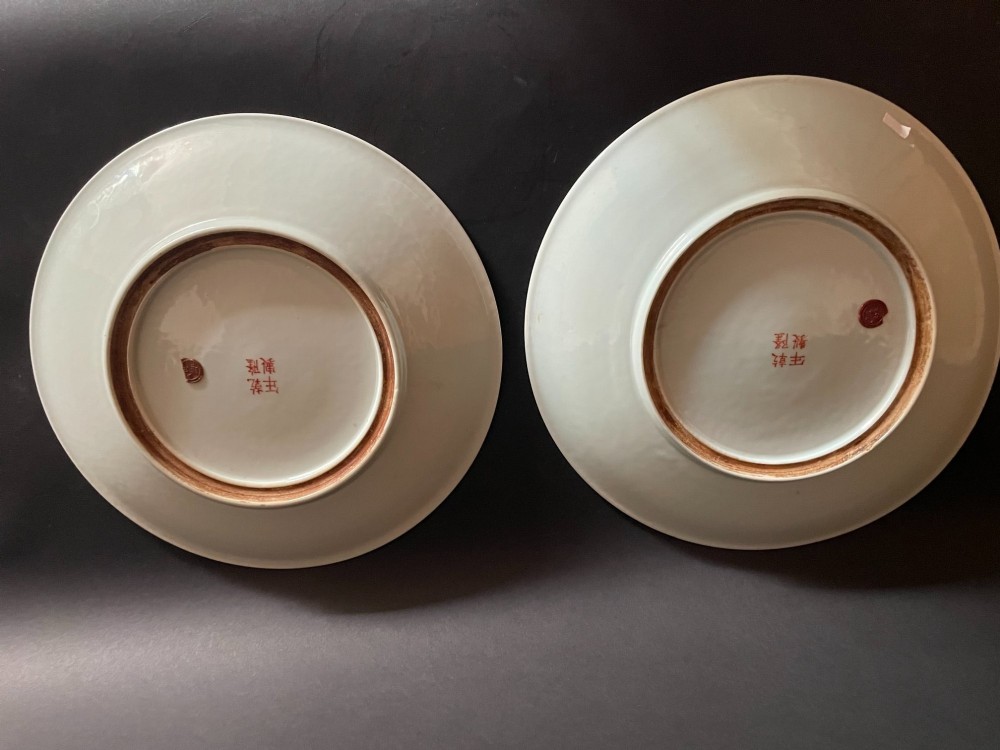 A pair of shallow circular Chinese porcelain dishes decorated with a dense all-over floral Millefleurs pattern in pink, green, yellow, and blue overglaze enamels. View IV