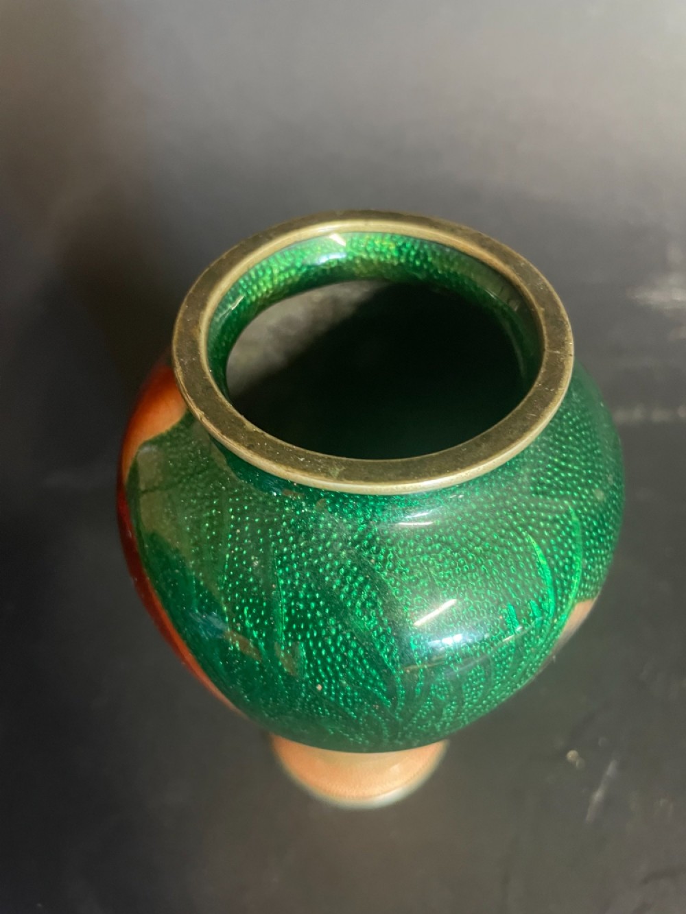 A baluster-shaped Japanese Gin-Bari cloisonne vase featuring swimming red and black goldfish against a translucent emerald green foil-backed enamel ground. View VI