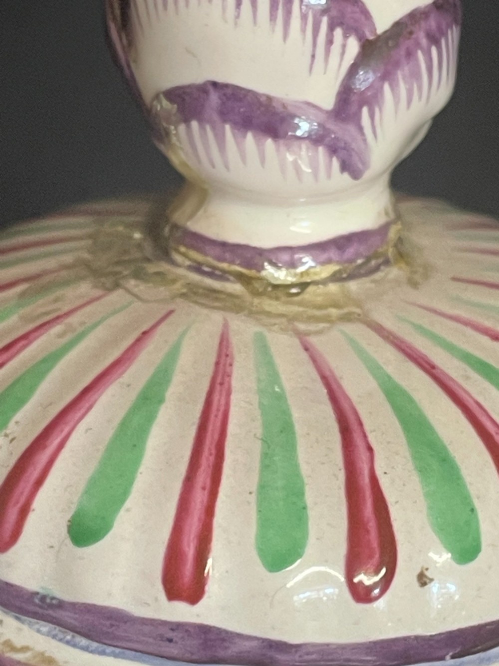 A pair of antique French Sceaux faience lidded urns decorated with hand-painted pastoral scenes, floral garlands, and moulding on square bases. View X