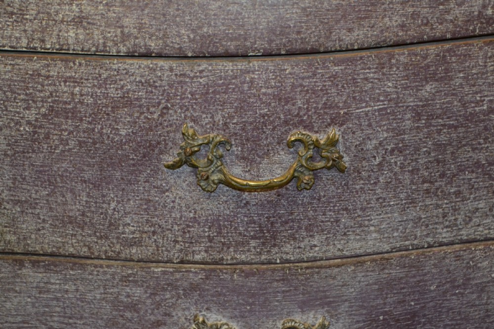 A small French-style three-drawer commode with a distressed grey paint finish, curved cabriole legs, decorative brass handles, and a veined marble top. View VII