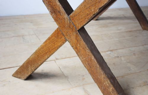 AN ENGLISH OAK XFRAME TABLE - ADDITIONAL PHOTO 4