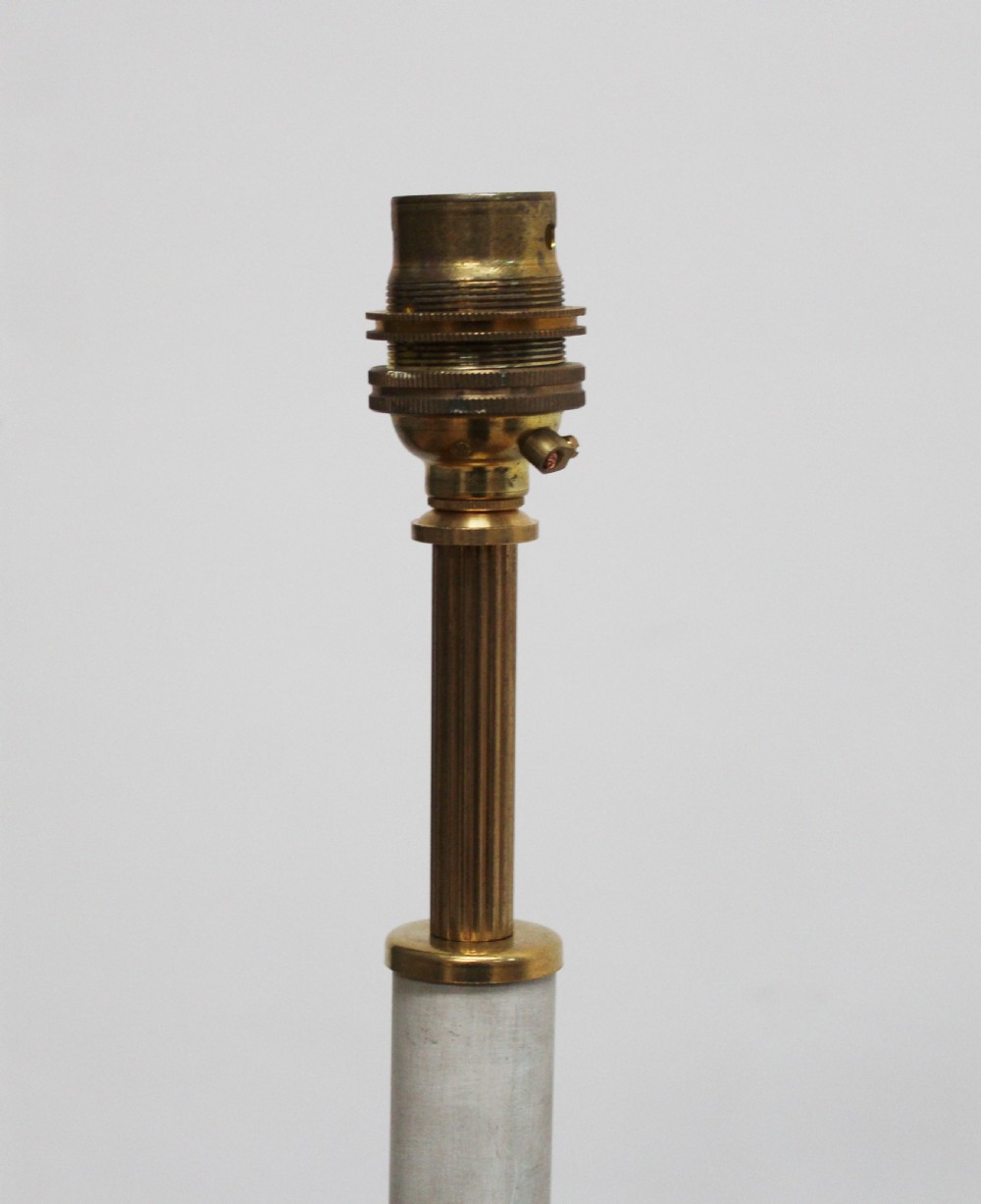 A 19th-century French Empire style table lamp featuring a dark patinated fluted column, gilt metal accents, and a triform base with paw feet. View III