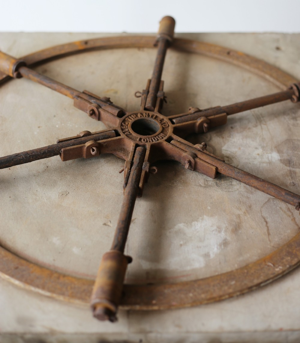 A 19th-century weathered wooden sculptors stand featuring a square revolving top supported by four tapered legs and cross-stretchers. View IV