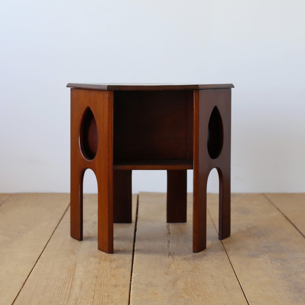 A Victorian mahogany side table featuring a hexagonal top, teardrop-shaped cutouts on the side panels, and gothic arch aprons. View II