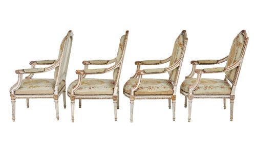 fig 2. A five-piece French giltwood salon suite comprising four carved armchairs and a matching sofa, all upholstered in cream woven tapestry with floral and figurative medallions.