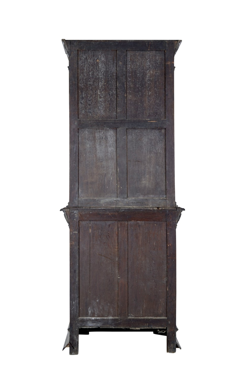 A tall 19th-century Flemish oak cabinet featuring an upper arched leaded glass door and a lower geometric carved wooden door. View IV