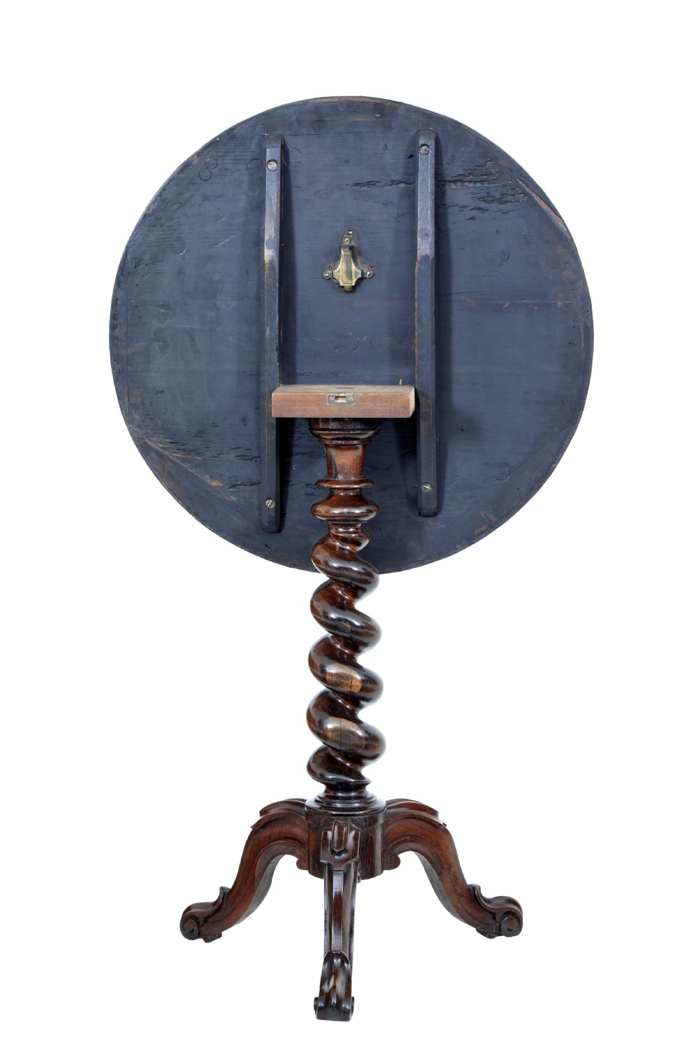 An early Victorian dark walnut tilt top occasional table featuring geometric starburst inlay on a circular top supported by a spiral barley twist pedestal and carved tripod legs. View III