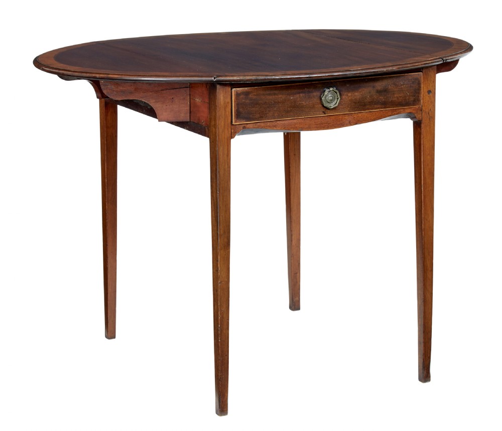 A 19th-century Regency mahogany Pembroke table featuring two hinged drop leaves, a single frieze drawer with a brass handle, and four tapered square legs. View II