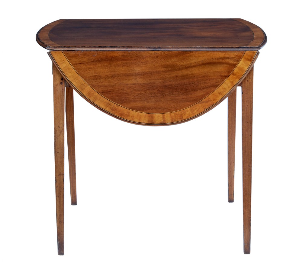 A 19th-century Regency mahogany Pembroke table featuring two hinged drop leaves, a single frieze drawer with a brass handle, and four tapered square legs. View VII