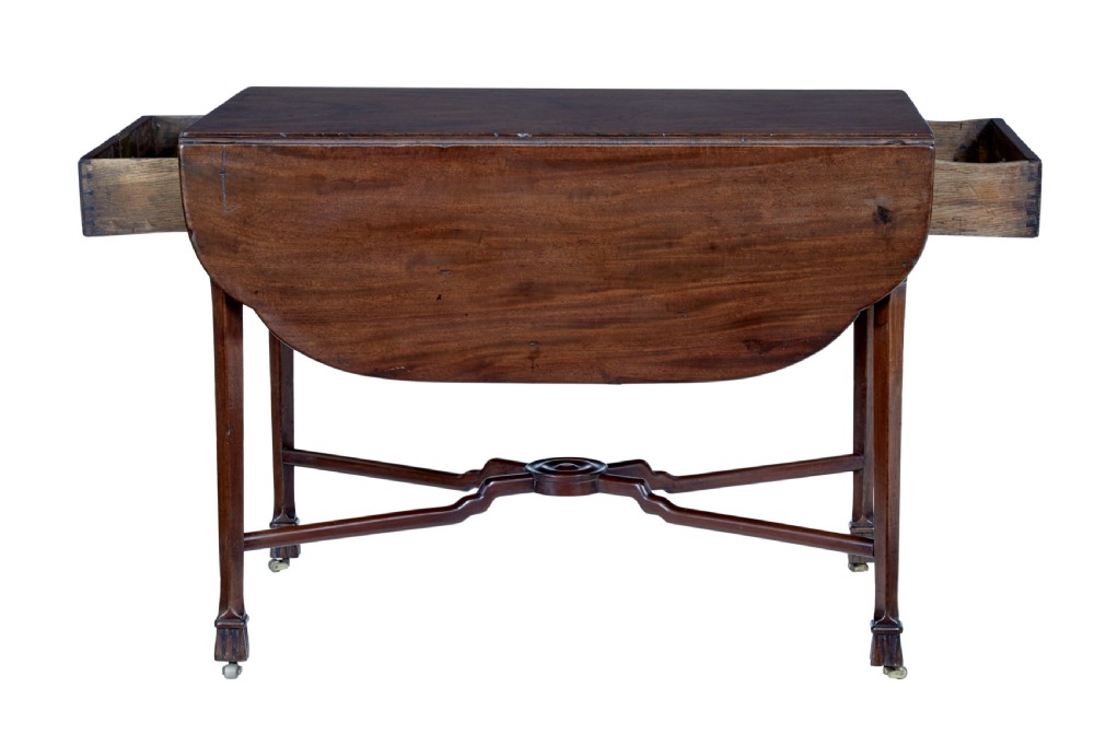 An 18th-century Chippendale mahogany Pembroke table featuring rounded drop leaves, a single end drawer with a brass handle, and an X-frame stretcher. View IV