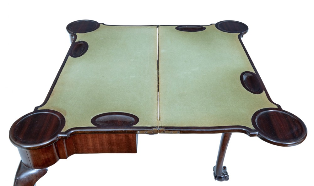 A 19th-century mahogany Chippendale Revival card table featuring a serpentine fold-over top, carved cabriole legs, and ball-and-claw feet. View III