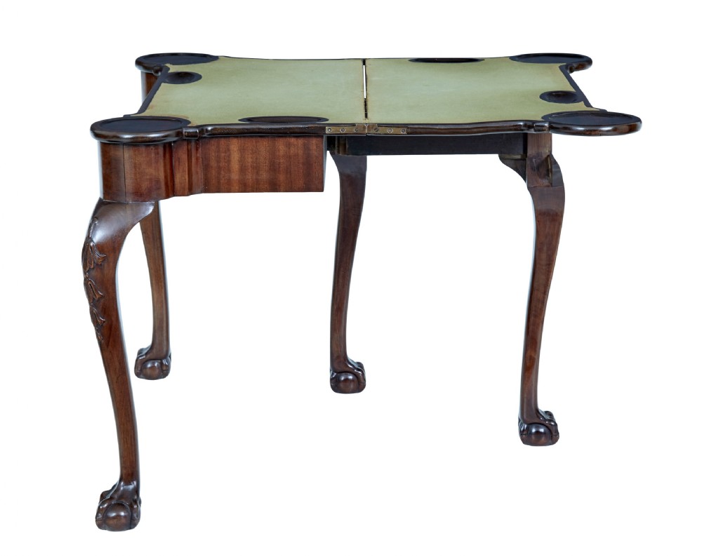 A 19th-century mahogany Chippendale Revival card table featuring a serpentine fold-over top, carved cabriole legs, and ball-and-claw feet. View VI