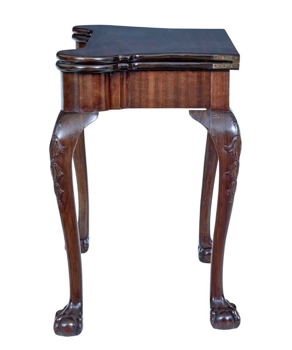 A 19th-century mahogany Chippendale Revival card table featuring a serpentine fold-over top, carved cabriole legs, and ball-and-claw feet. View VIII