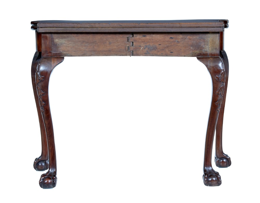 A 19th-century mahogany Chippendale Revival card table featuring a serpentine fold-over top, carved cabriole legs, and ball-and-claw feet. View IX