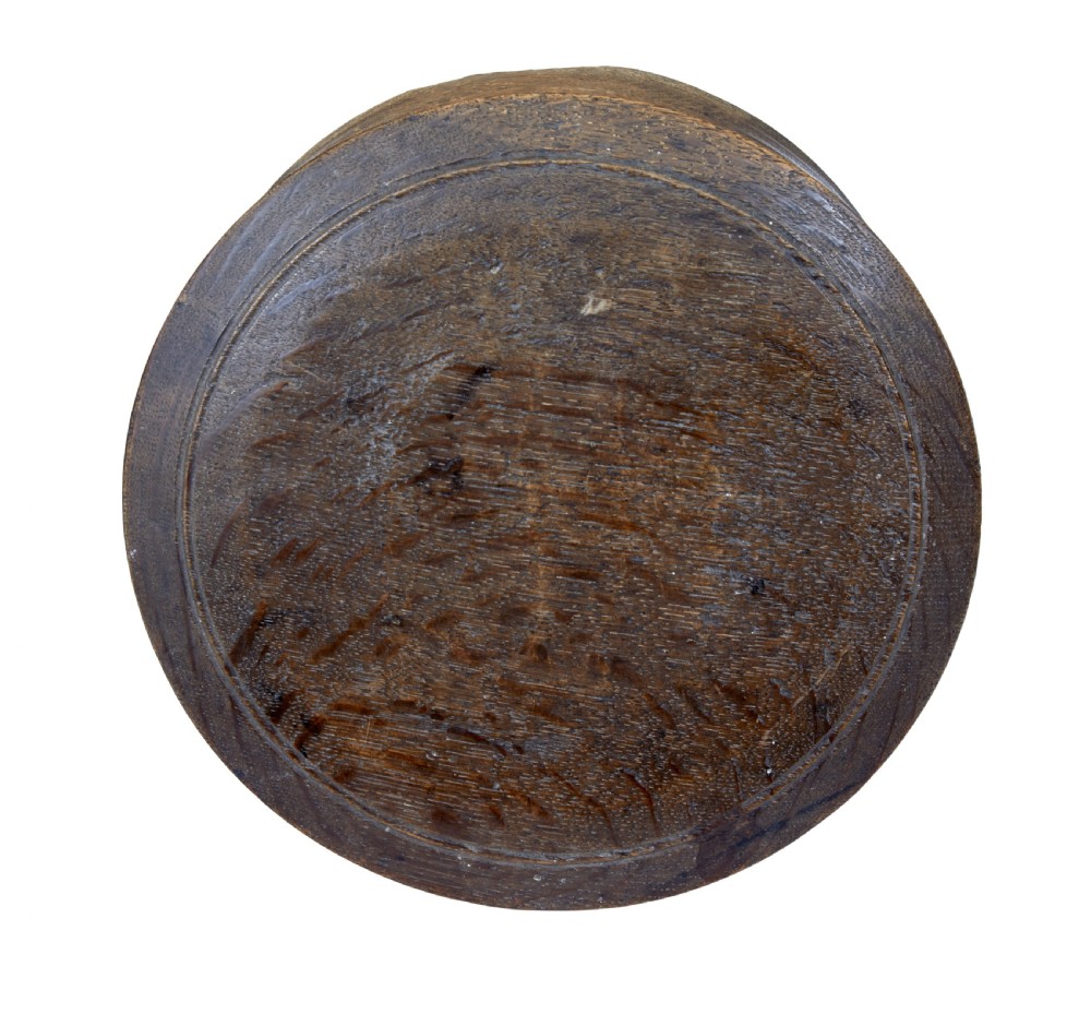 A small round early 19th-century Swedish oak lidded box with turned circular grooves around the rim. View IV