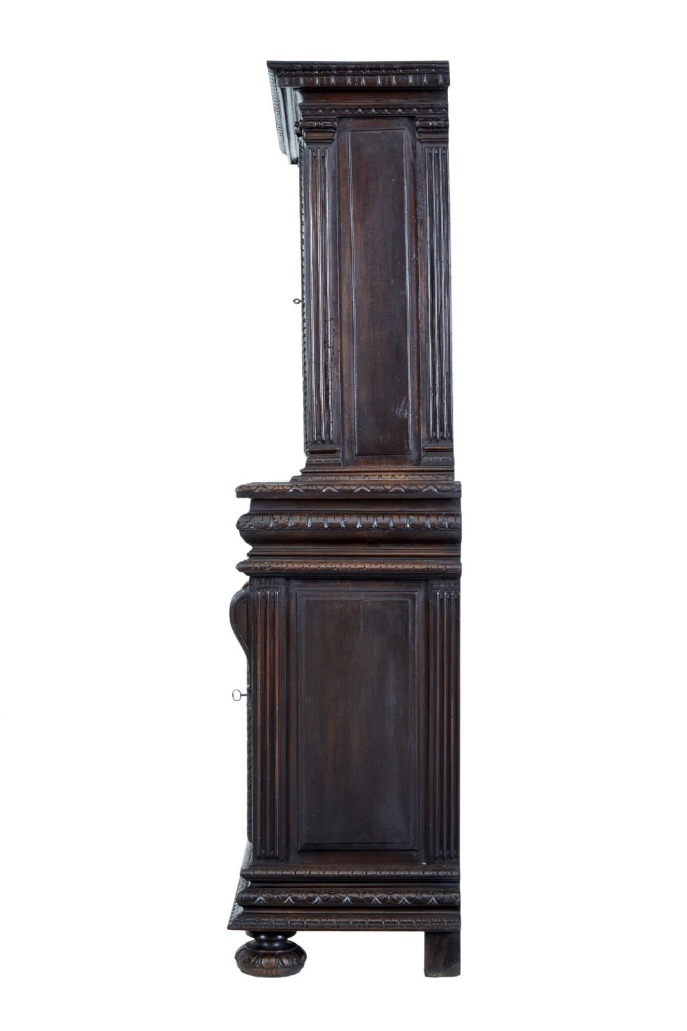 A two-section mid-19th century dark walnut cabinet featuring detailed relief carvings on the panelled doors, fluted columns, and flattened bun feet. View III