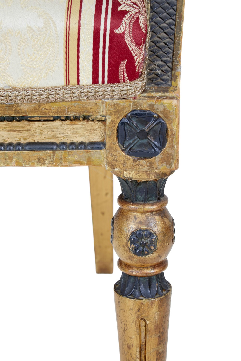 A pair of 19th-century Swedish giltwood armchairs featuring curved backs, black carved terminals with female heads, and red and cream striped fabric upholstery. View VII