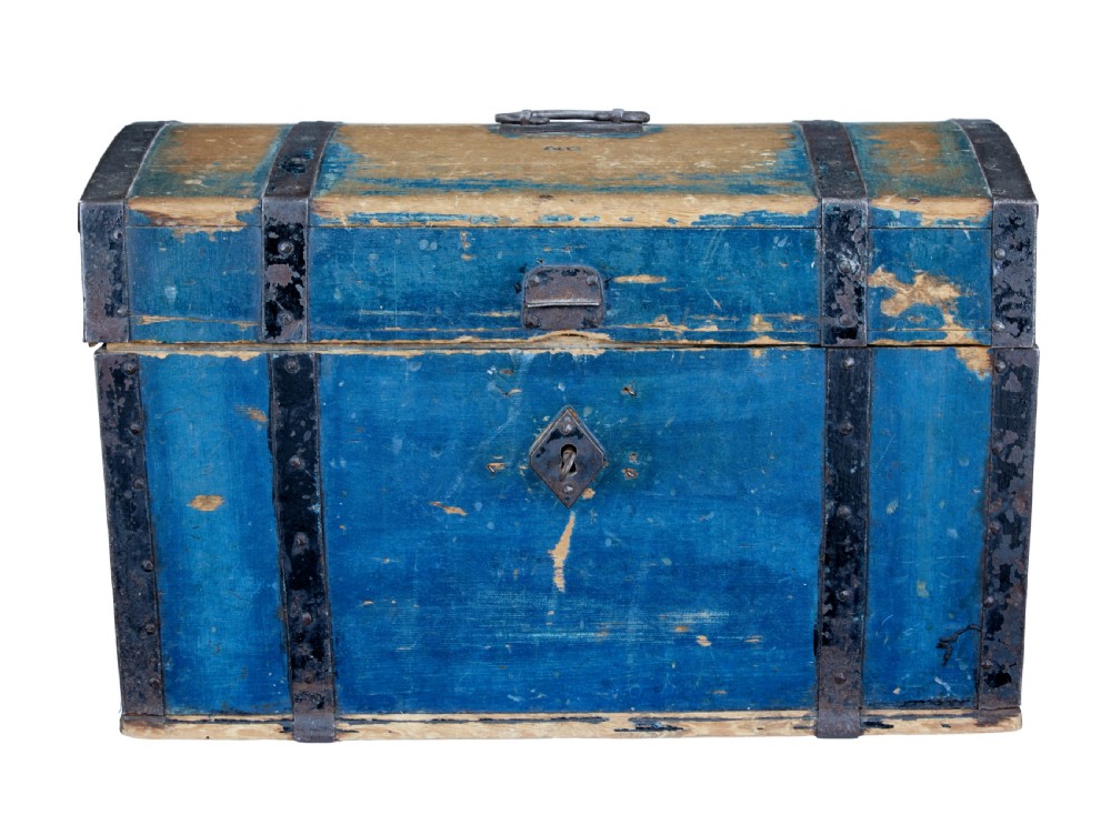 A nineteenth-century Swedish pine box with a domed lid, distressed blue paint finish, and black iron binding straps. View II