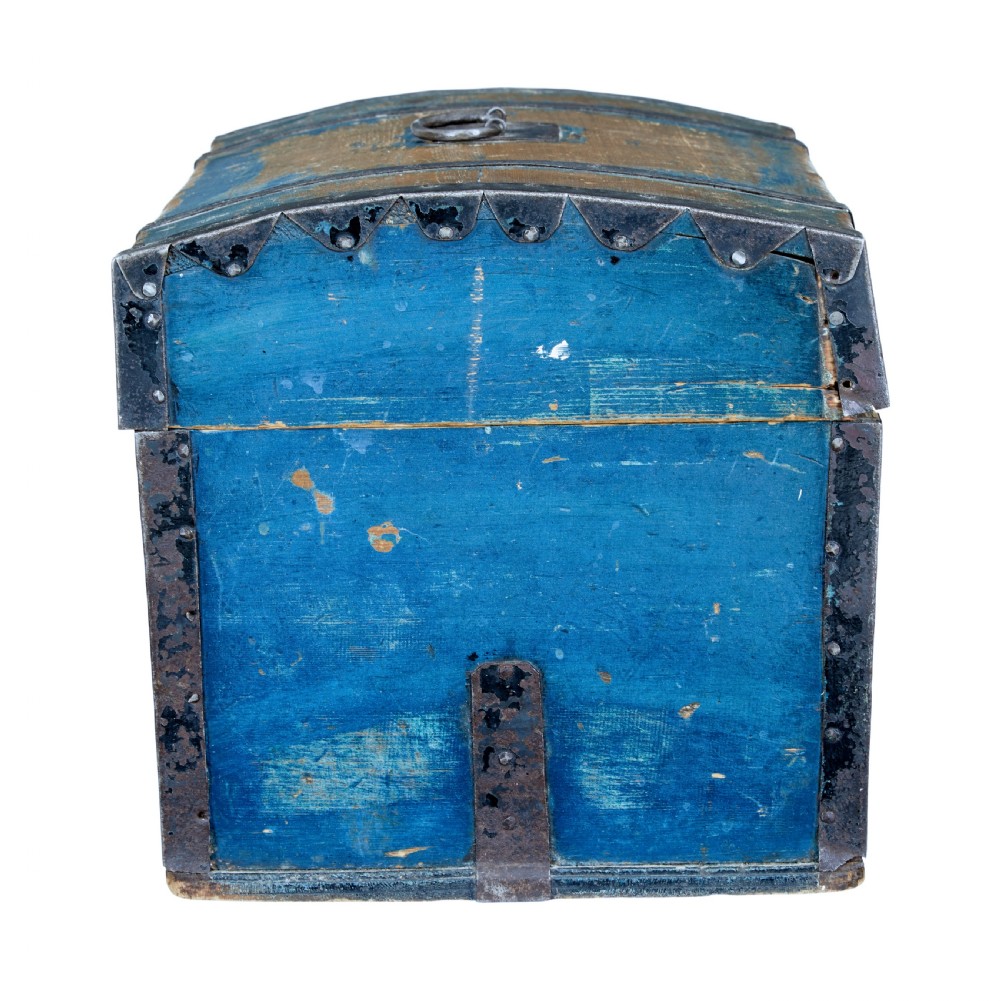A nineteenth-century Swedish pine box with a domed lid, distressed blue paint finish, and black iron binding straps. View III