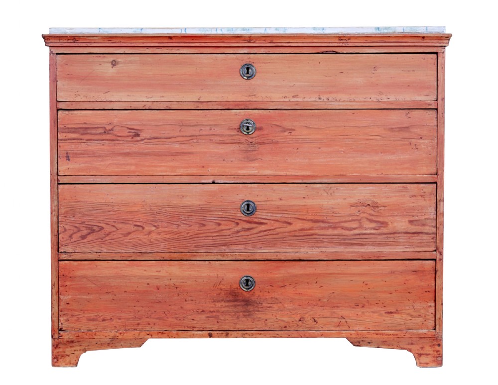An early 19th-century Swedish pine chest of drawers featuring four graduated drawers with terracotta red paint and central metallic escutcheons. View II