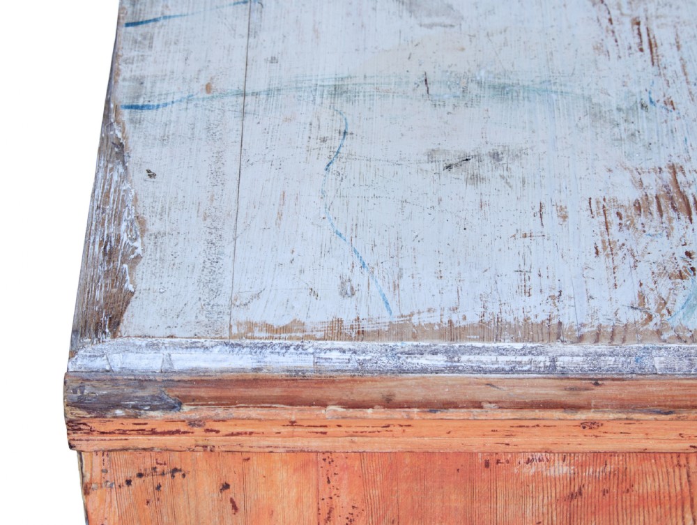 An early 19th-century Swedish pine chest of drawers featuring four graduated drawers with terracotta red paint and central metallic escutcheons. View IX