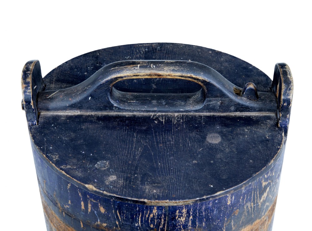A mid-19th-century Swedish pine storage container featuring a distressed blue painted finish, stave construction, and an arched wooden top handle. View V