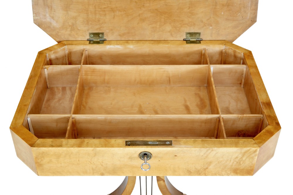 A 19th-century Swedish satin birch occasional table featuring a lyre-shaped pedestal base, a single drawer with a key, and a quadruped plinth. View IX