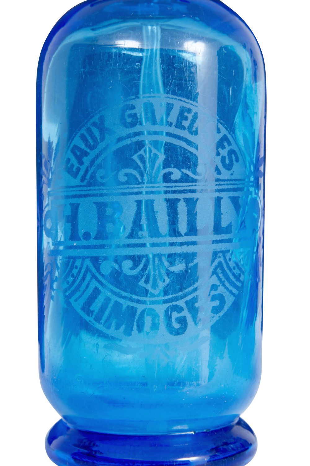 A set of four early twentieth-century French bright blue etched glass soda syphons with grey metal tops. View III