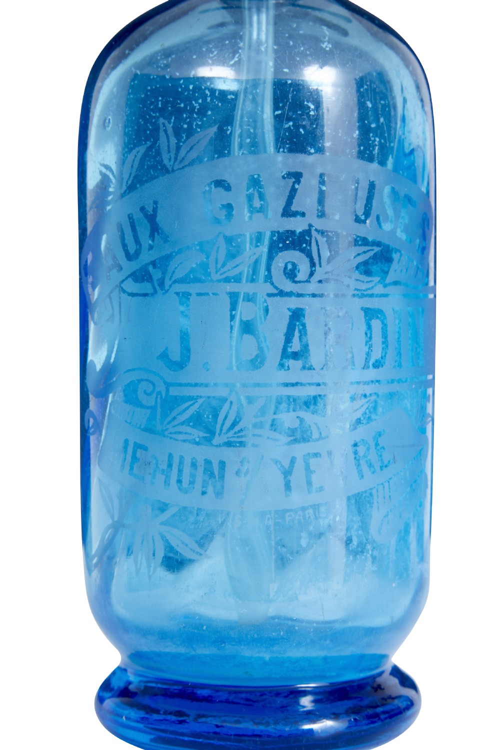 A set of four early twentieth-century French bright blue etched glass soda syphons with grey metal tops. View IV