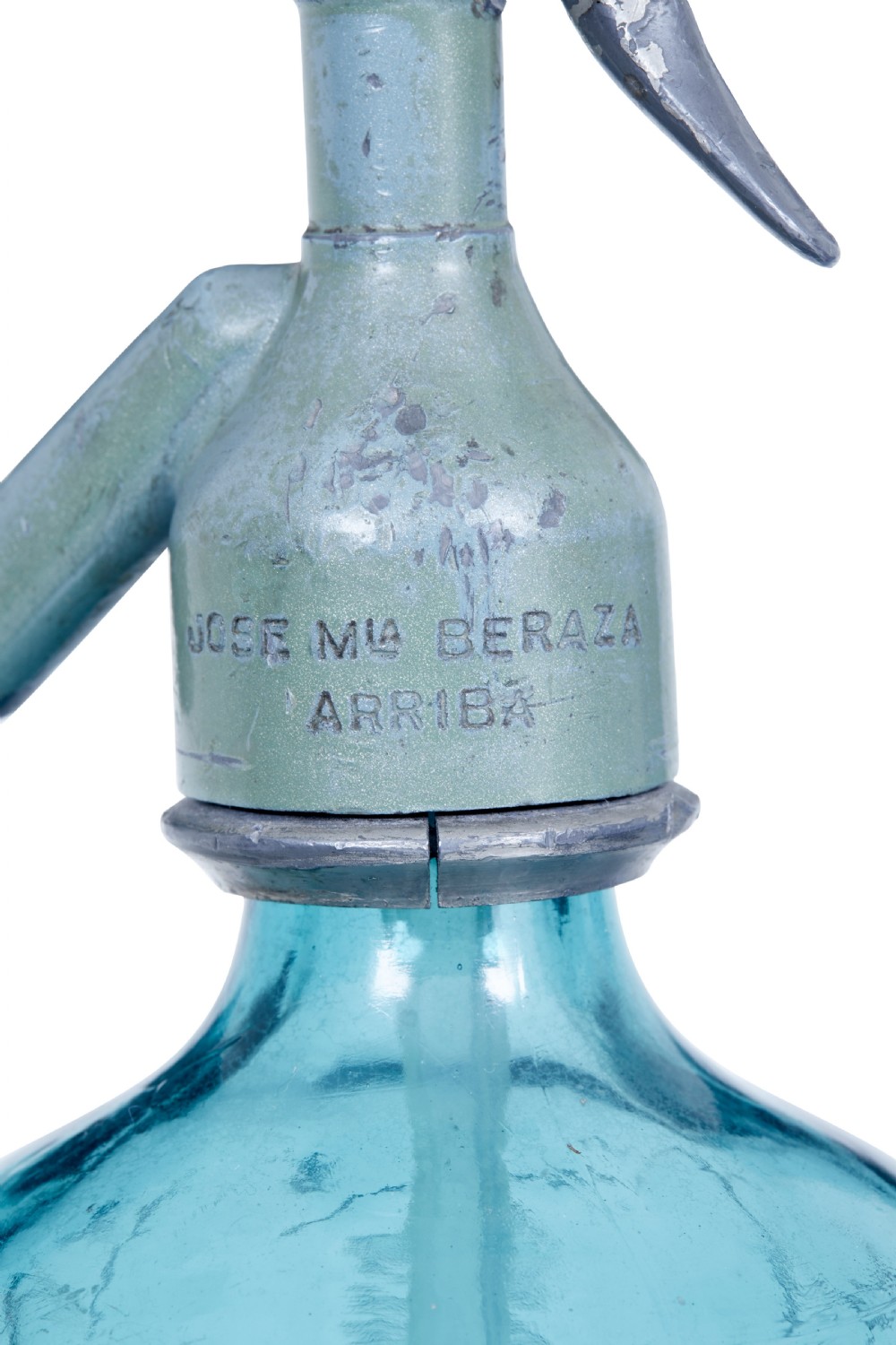 A set of four early twentieth-century French bright blue etched glass soda syphons with grey metal tops. View VII