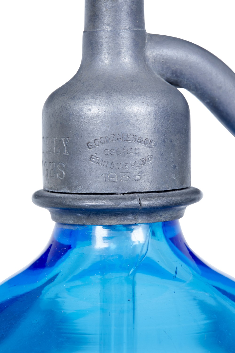 A set of four early twentieth-century French bright blue etched glass soda syphons with grey metal tops. View VIII