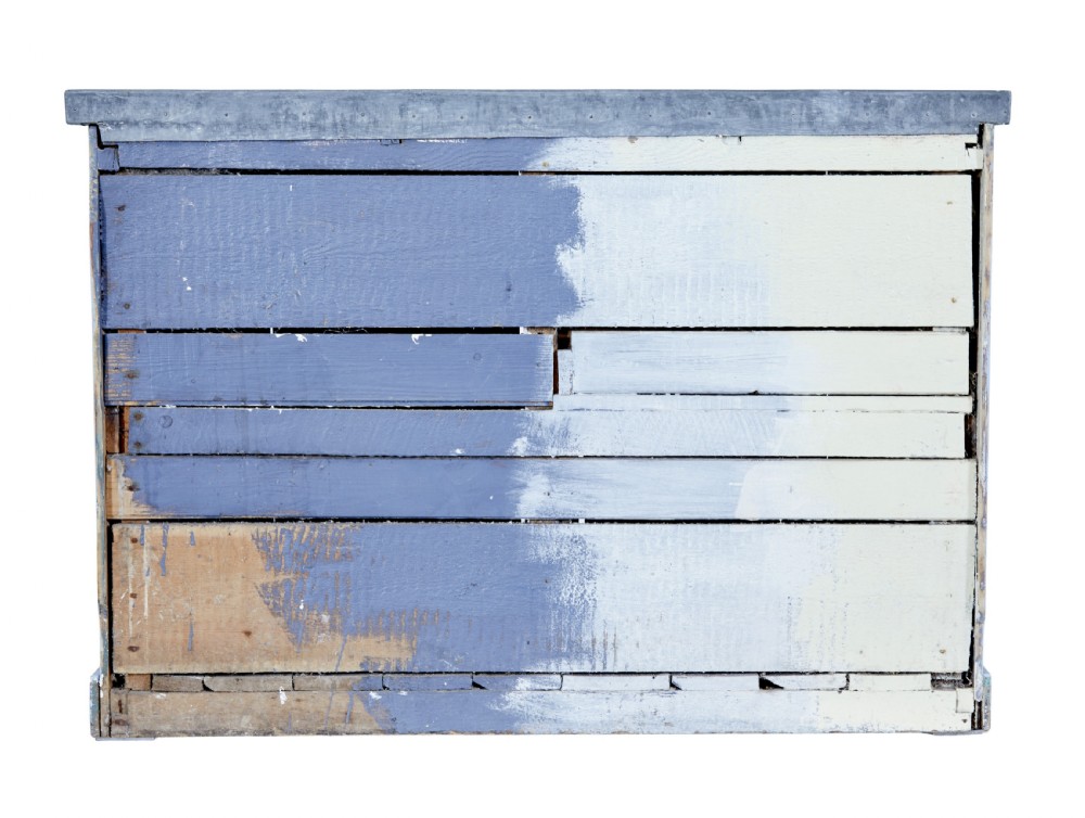 A 19th-century rustic light blue painted pine washstand featuring double planked doors with turn-latch handles and a metal-bound top. View VI