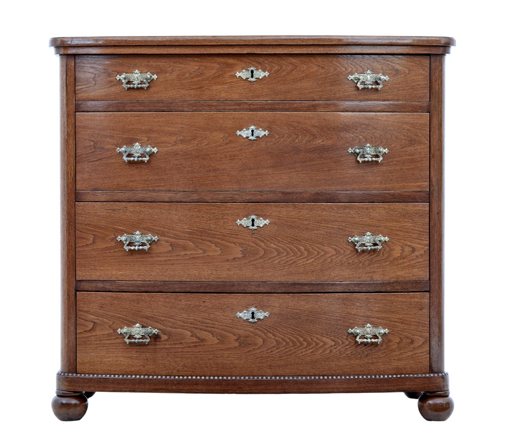 19TH CENTURY BOWFRONT OAK CHEST OF DRAWERS View II