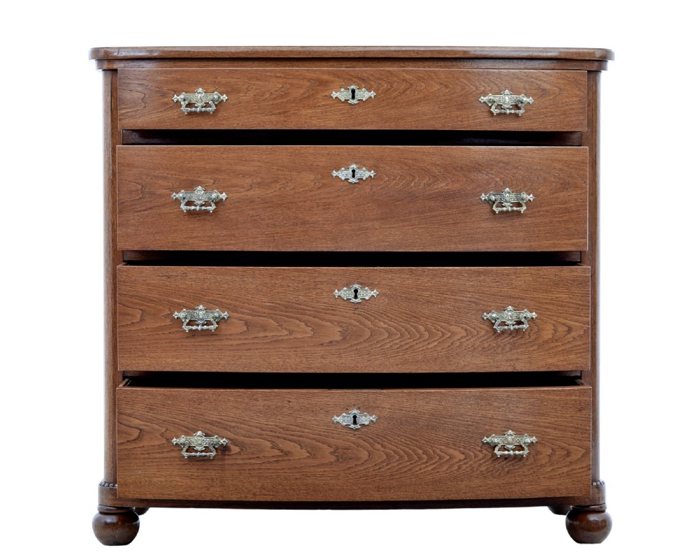 19TH CENTURY BOWFRONT OAK CHEST OF DRAWERS View III