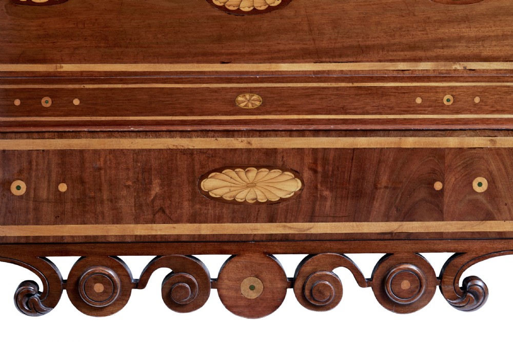 A nineteenth-century mahogany four-poster bed frame featuring carved posts with pink porcelain sections, marquetry panelling, and an ornate trefoil canopy trim. View X