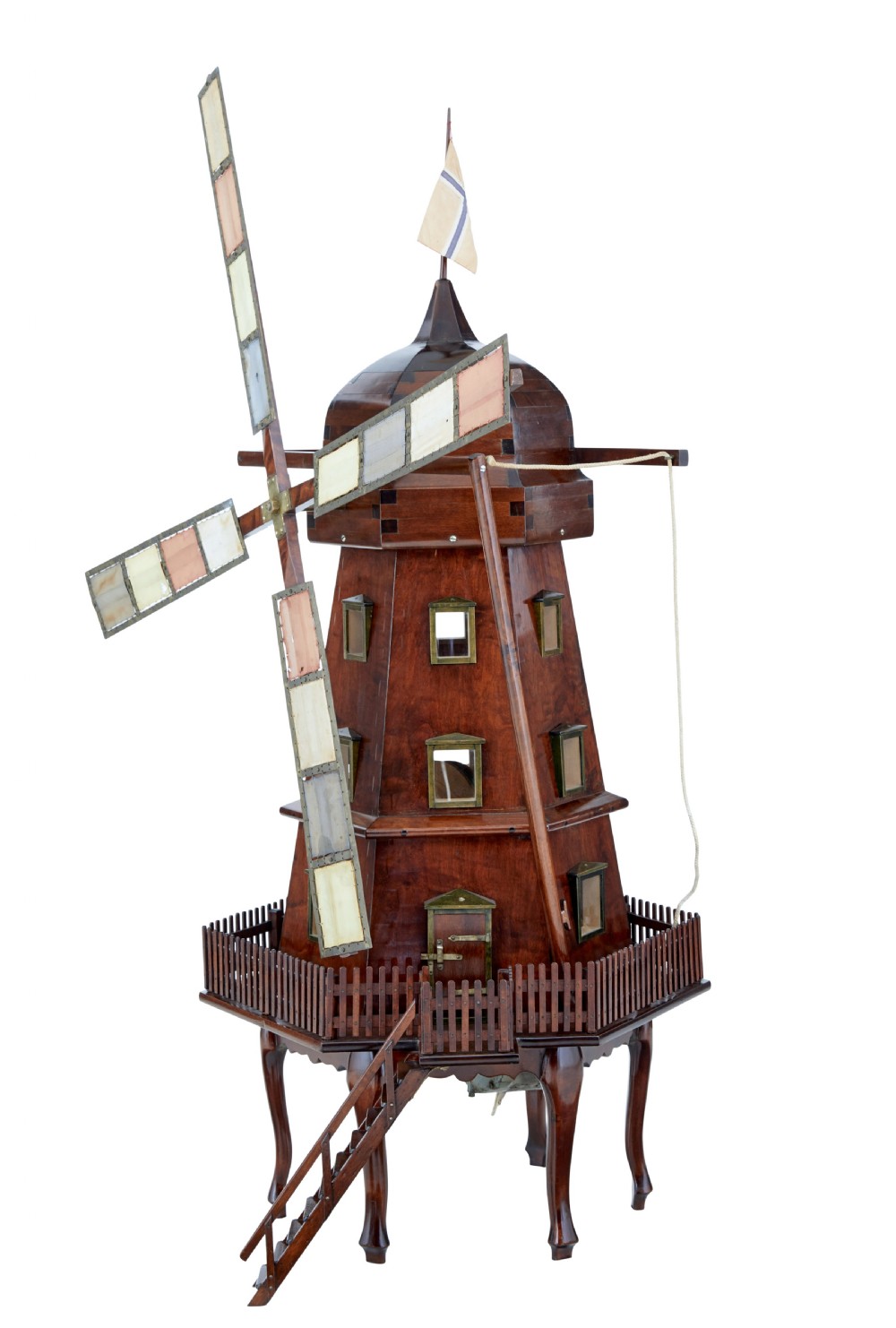 An early twentieth-century wooden scale model of a Dutch windmill, featuring multi-pane sails, brass fittings, a railed balcony, and a wooden ladder. View II