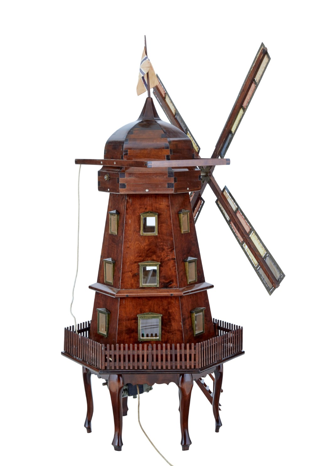 An early twentieth-century wooden scale model of a Dutch windmill, featuring multi-pane sails, brass fittings, a railed balcony, and a wooden ladder. View V
