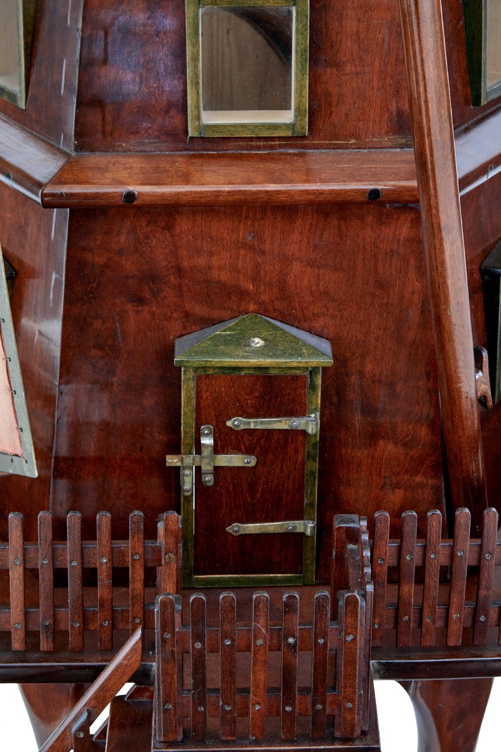 An early twentieth-century wooden scale model of a Dutch windmill, featuring multi-pane sails, brass fittings, a railed balcony, and a wooden ladder. View X