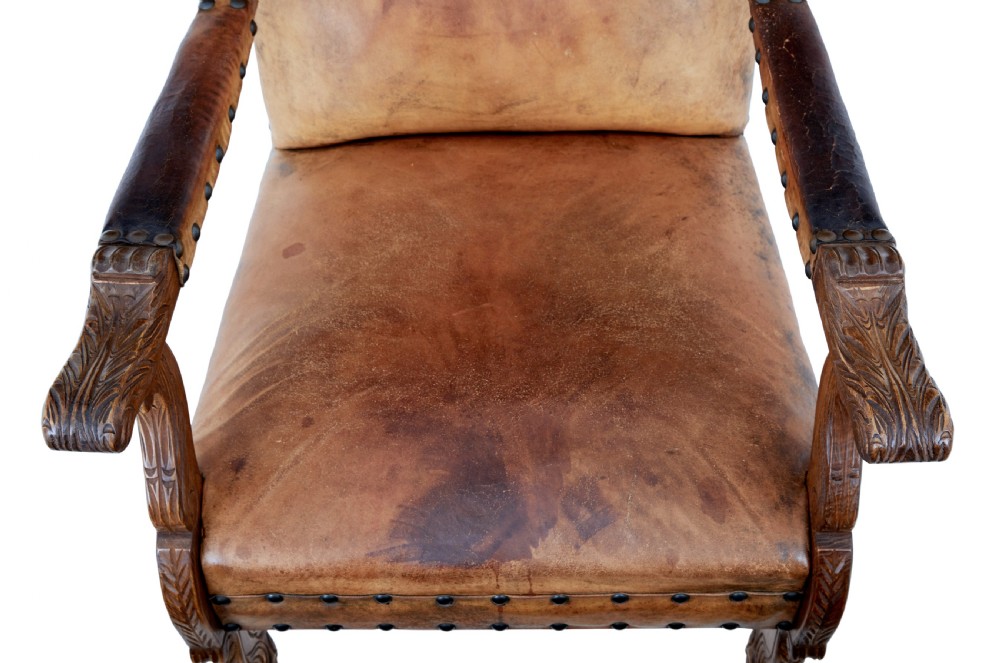 PAIR OF 19TH CENTURY CARVED OAK AND LEATHER ARMCHAIRS View II