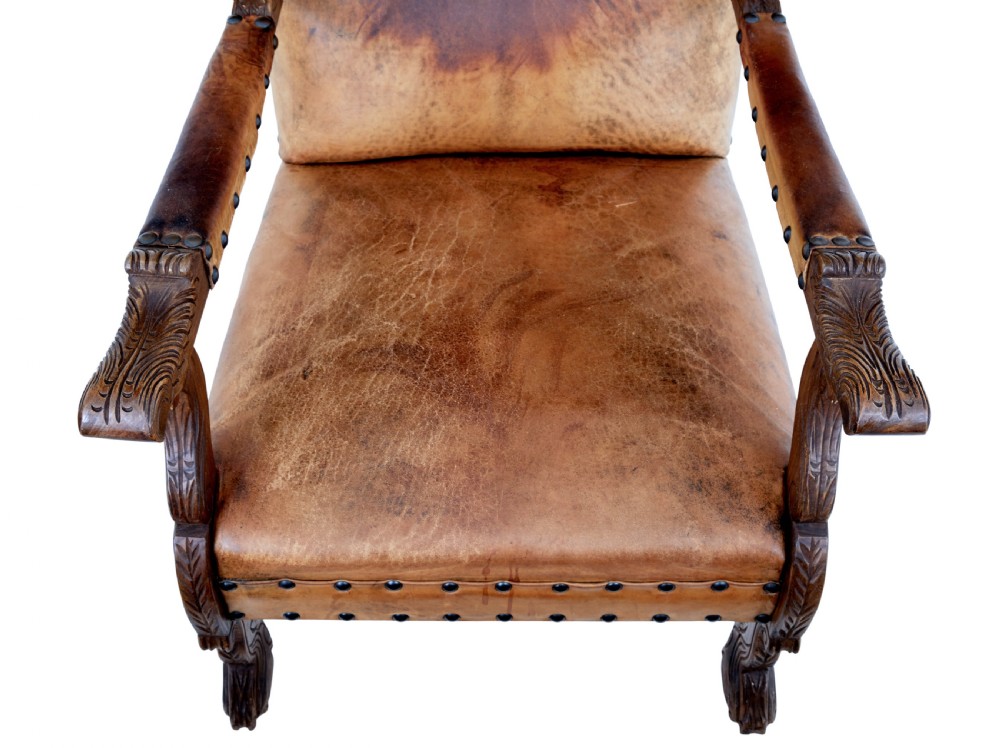 PAIR OF 19TH CENTURY CARVED OAK AND LEATHER ARMCHAIRS View V