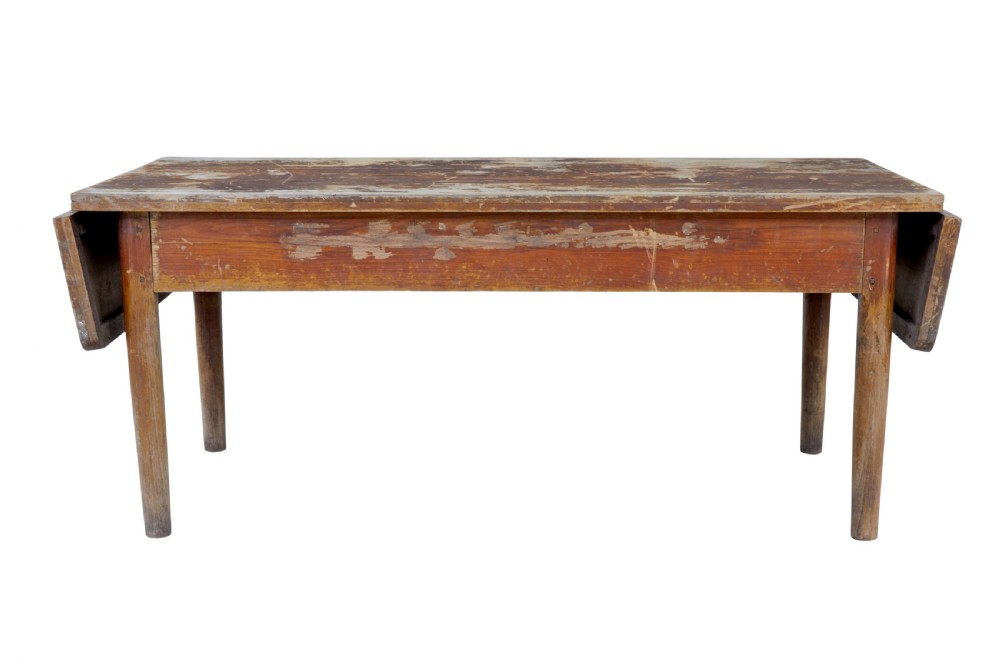 A long 19th-century Burmese teak table with a weathered brown finish and white hand-painted Burmese script across the front frieze. View V
