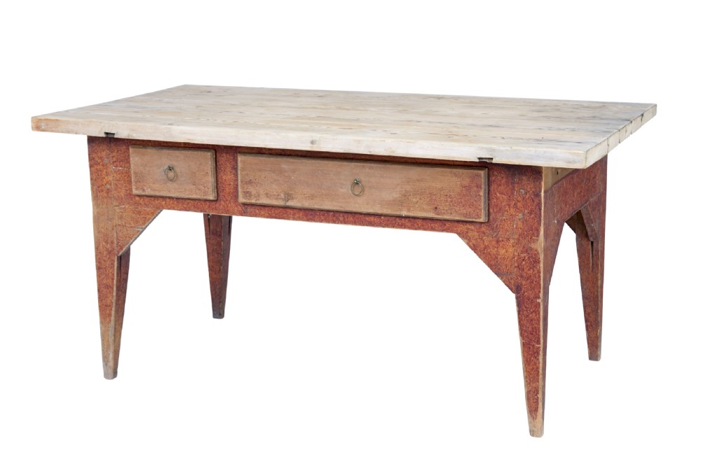 A mid 19th-century rustic pine kitchen table featuring a light wood top, a painted reddish-brown apron, and four tapered square legs. View IV