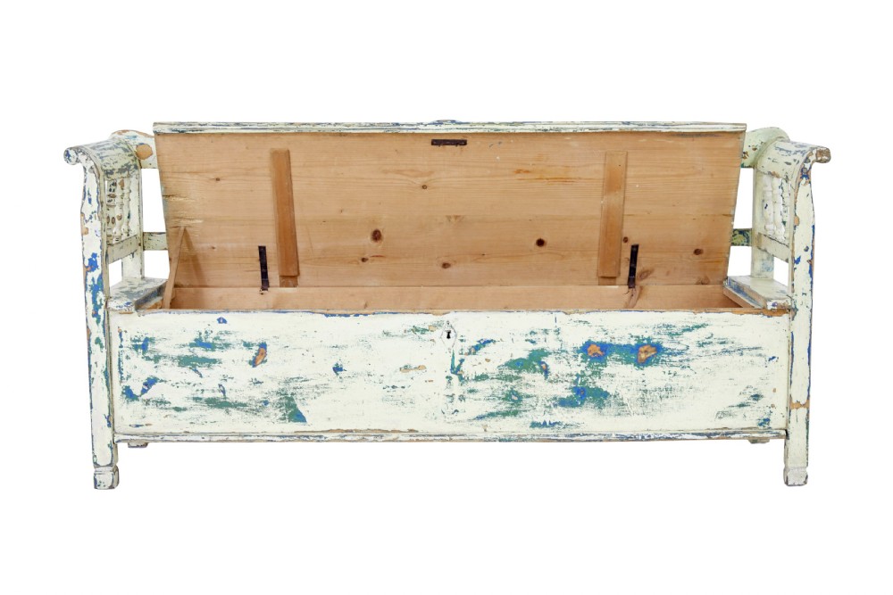 A 19th-century Swedish painted pine storage bench with distressed off-white and blue paint, spindle backrest, and box seat base. View III