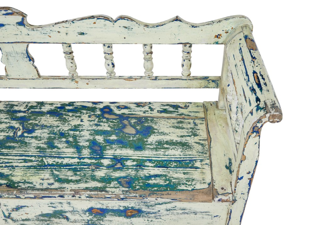 A 19th-century Swedish painted pine storage bench with distressed off-white and blue paint, spindle backrest, and box seat base. View XI