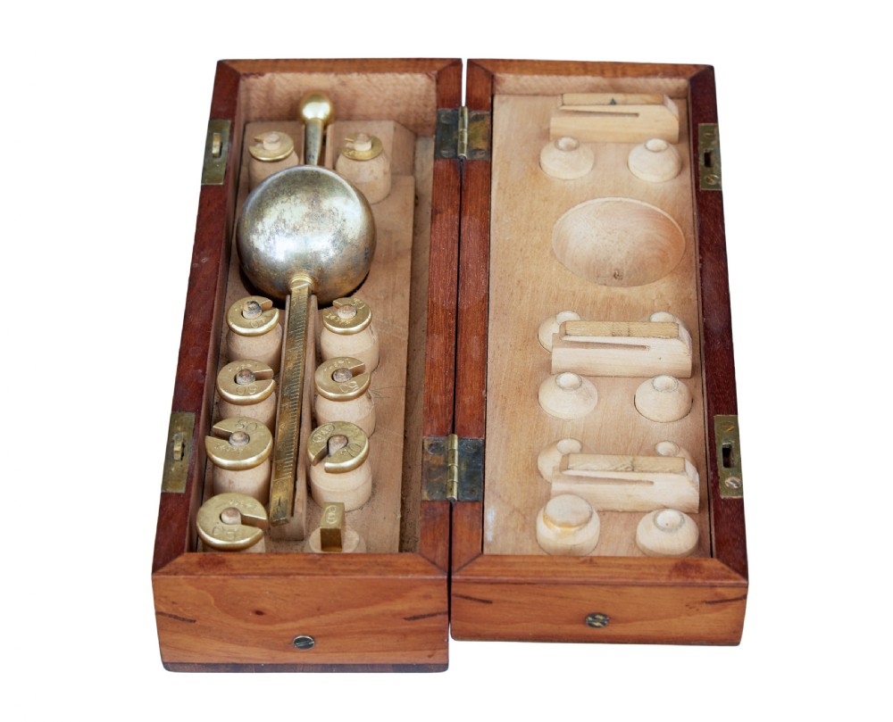A rectangular Victorian mahogany wooden box with dual brass latches and an inlaid ivory-coloured makers plaque on the top lid. View IV